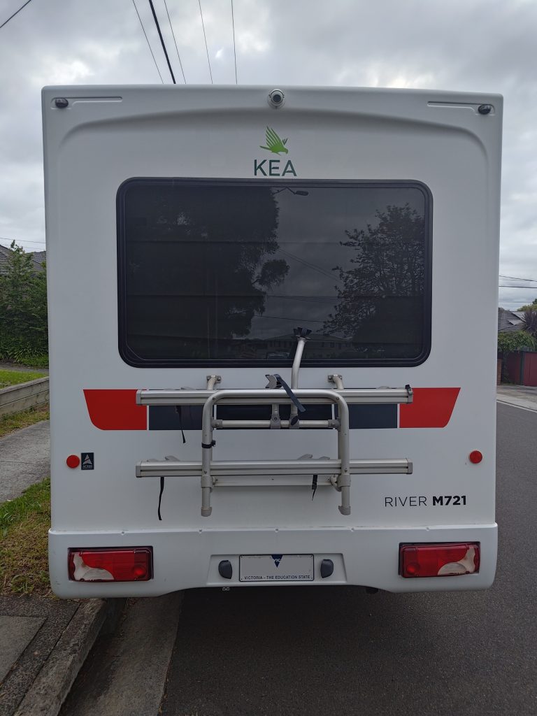 Rear view of the Mercedes Sprinter KEA motorhome before branding, displaying the factory rear layout and ladder rack.